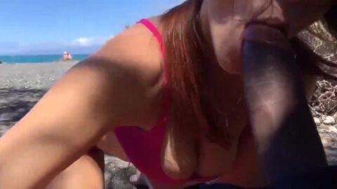 Steamy Beach BBC Blowjob with Horny Slut Sucking Huge Black Cock Image